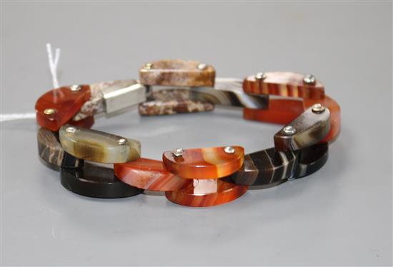 A white metal mounted Scottish hardstone and agate set demi-lune link bracelet, approx. 19.6cm.